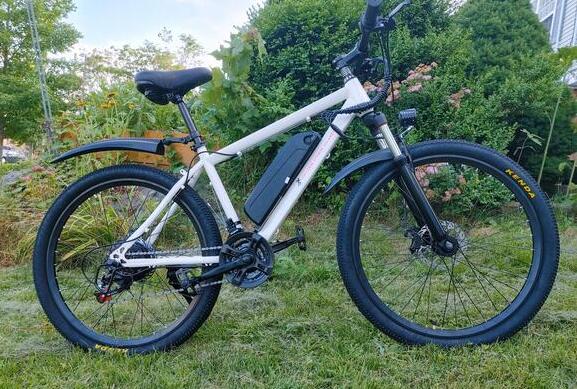 White Capital Bikes electric bike with rider in Ottawa Gatineau